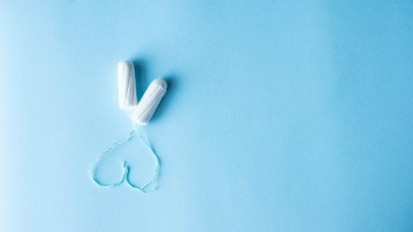 tampon-heart-blue-background